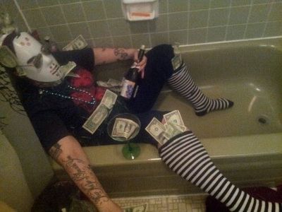 Drunk-Man-With-Money-In-Bath-Tub-Funny-Passed-Out-Image.jpg